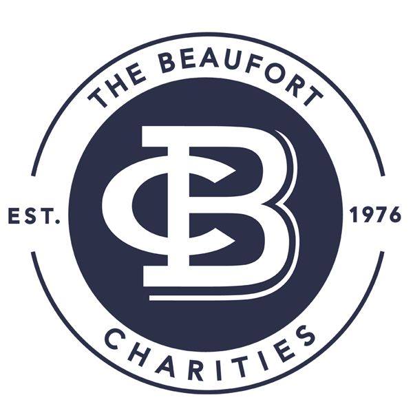 A circular logo with The Beaufort Charities written around the edge, EST. 1976 on either side, and a large stylized CB in the center, all in dark blue and white.